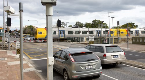 Cars stopped at a level crossing